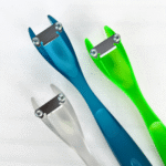 Flower Power Stem Trimmer with angled blade for cutting flower stems and extending vase life.